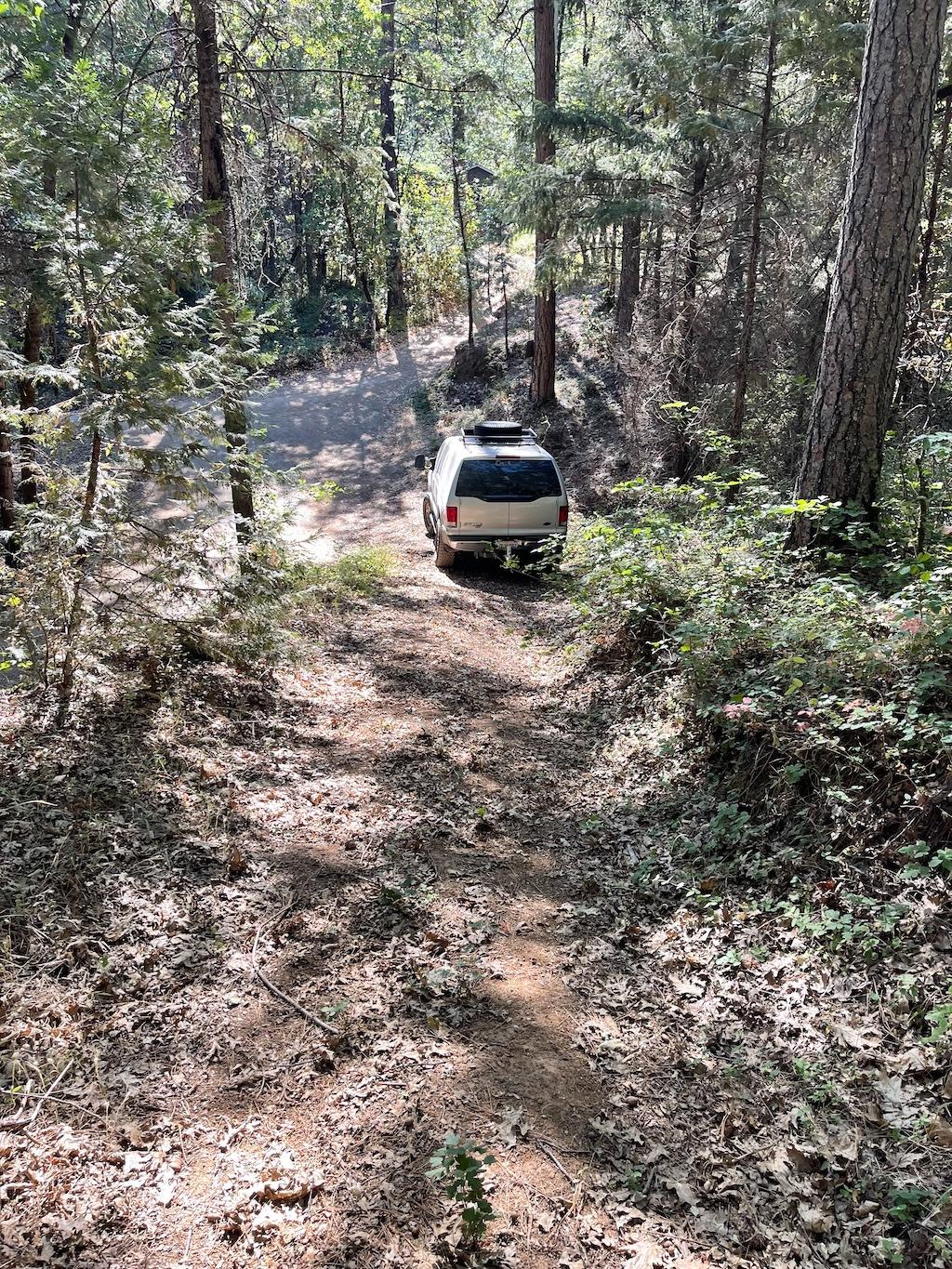 20676 Spring Garden Road Foresthill, CA 95631 - Photo 3 of 10 a car parked in front of a road