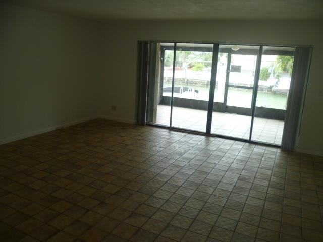 423 Sombrero Beach Road, Unit 7 Marathon, FL 33050 - Photo 5 of 12 Large Living area with Canal View