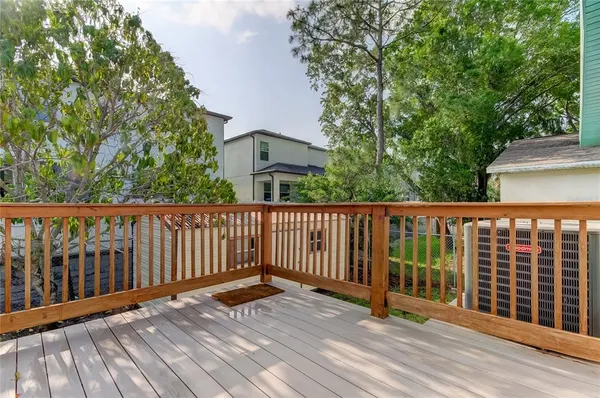 a view of a wooden roof deck
