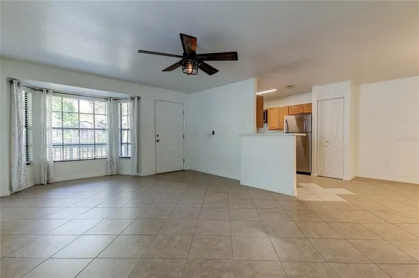 a view of an empty room with a window
