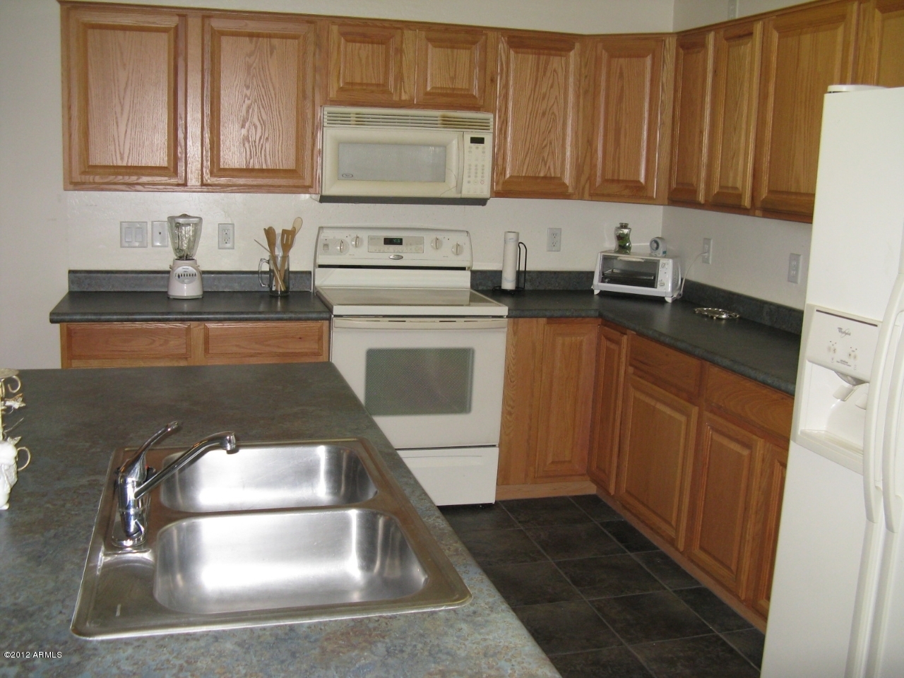 12537 West Redfield Road El Mirage, AZ 85335 - Photo 11 of 22 Kitchen from the entry way