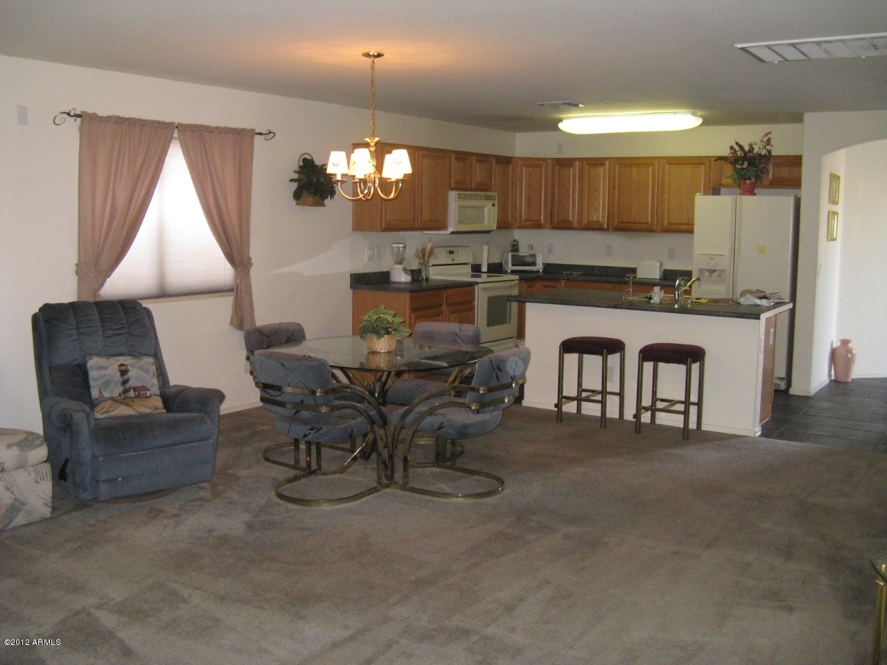 12537 West Redfield Road El Mirage, AZ 85335 - Photo 9 of 22 Living room and kitchen