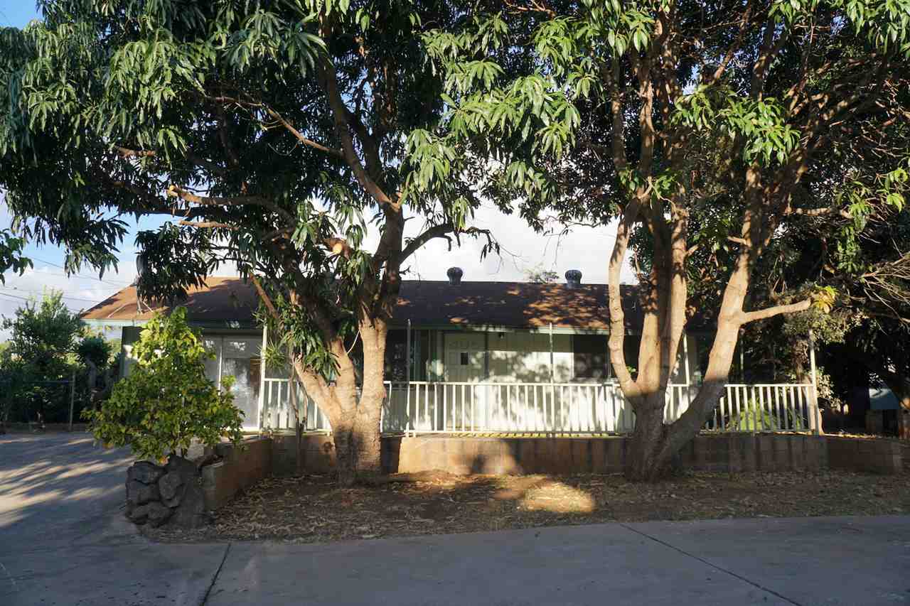 440 Mikioi Place Kihei, HI 96753 - Photo 17 of 28 a front view of a house with a yard