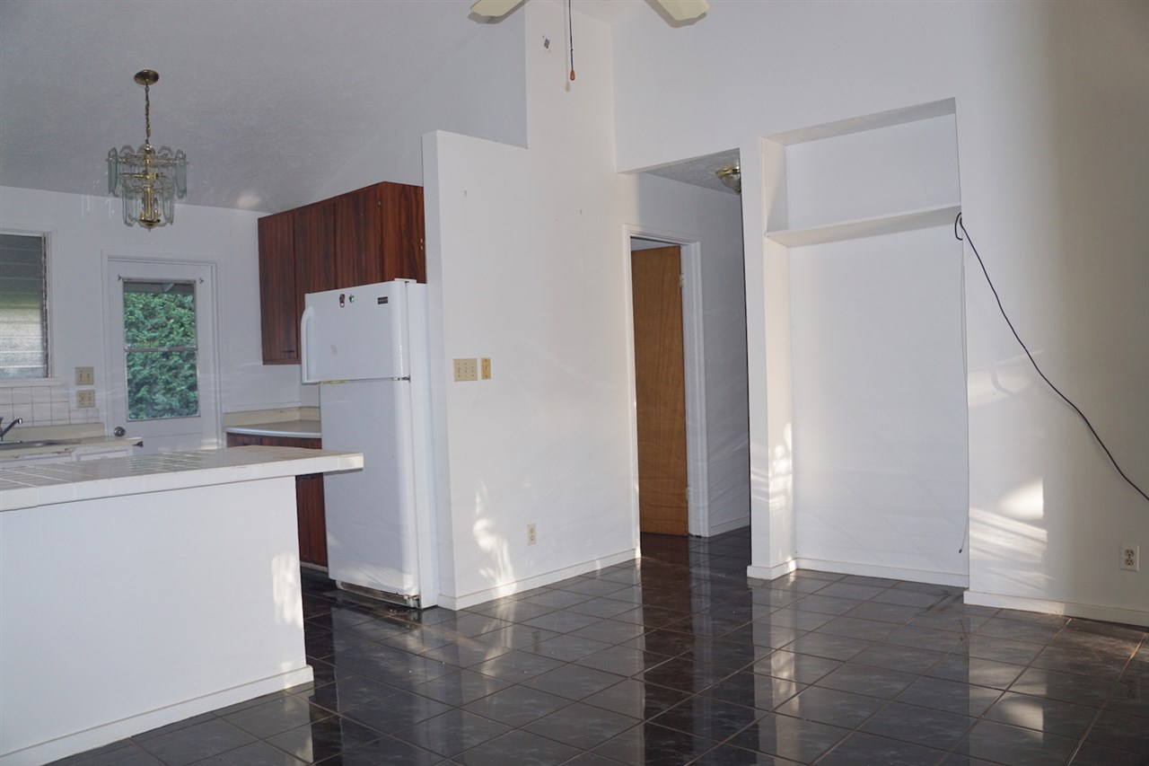 440 Mikioi Place Kihei, HI 96753 - Photo 20 of 28 a kitchen with stainless steel appliances a refrigerator and a sink