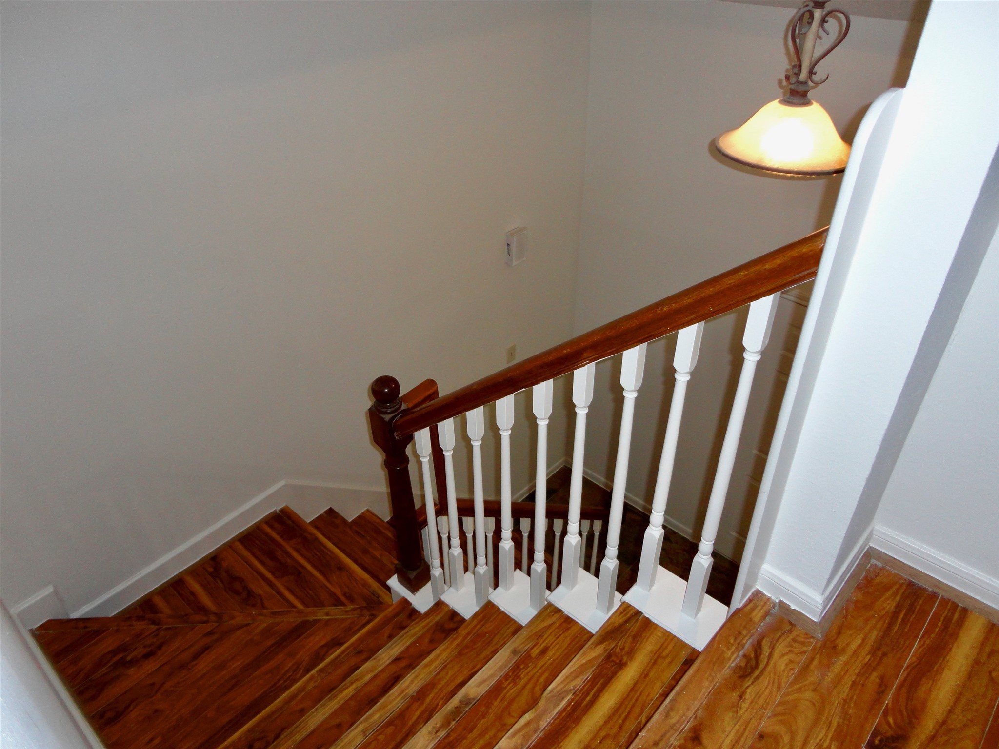 6700 Richardson Road, Unit 204 Houston, TX 77069 - Photo 15 of 39 a view of stairs and a floor to ceiling window