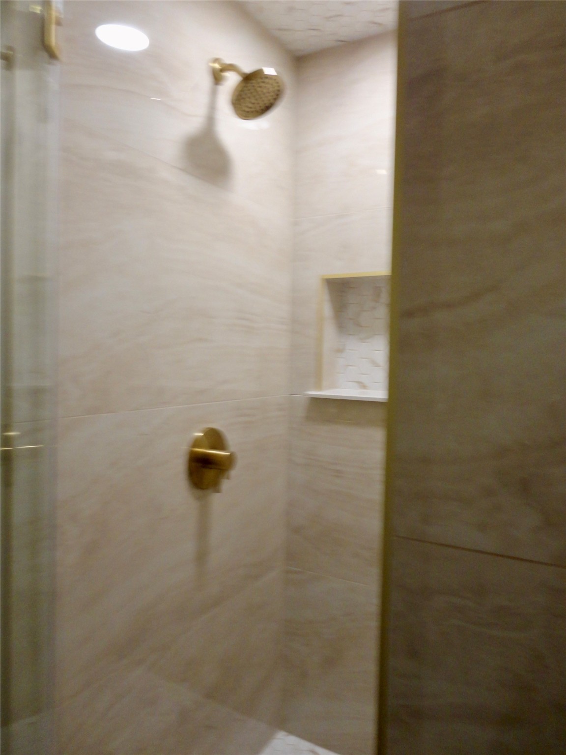 6700 Richardson Road, Unit 204 Houston, TX 77069 - Photo 22 of 39 a bathroom with a shower