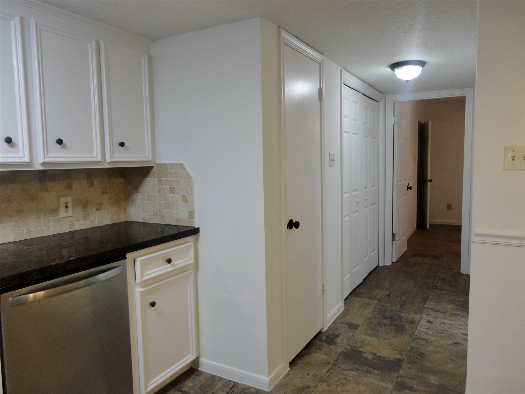 6700 Richardson Road, Unit 204 Houston, TX 77069 - Photo 27 of 39 a view of a kitchen with cabinets