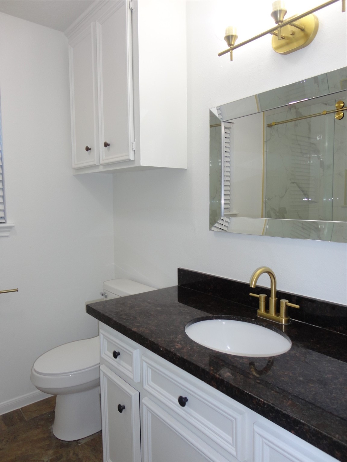 6700 Richardson Road, Unit 204 Houston, TX 77069 - Photo 30 of 39 a bathroom with a sink and a toilet