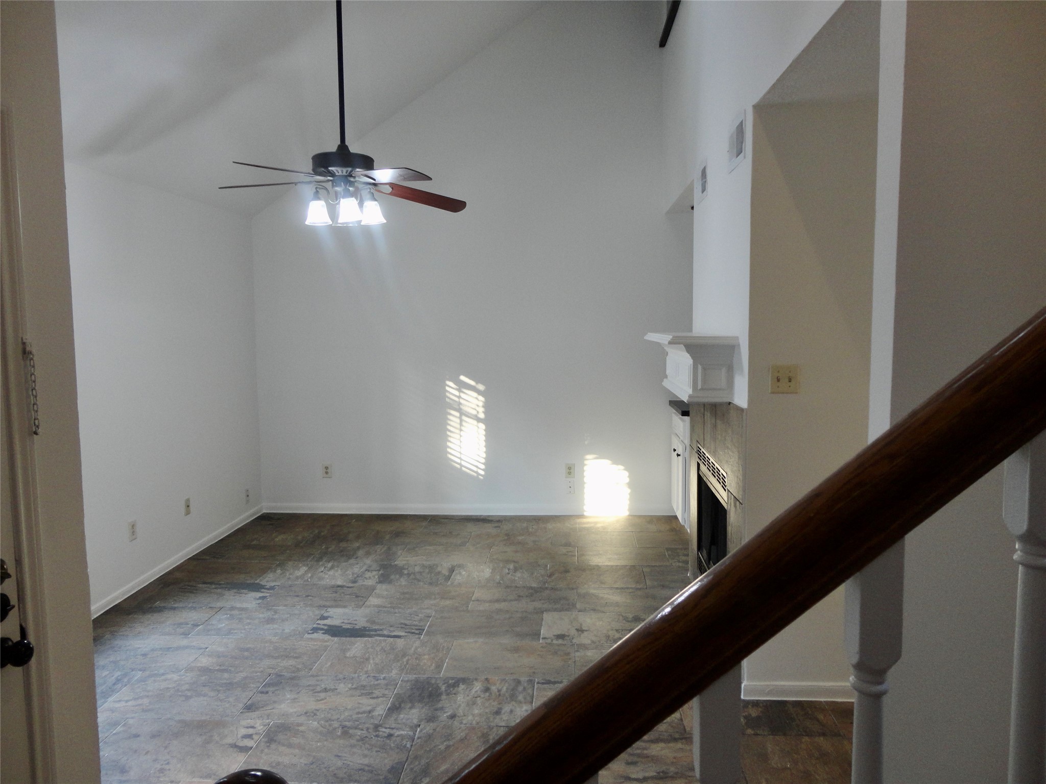 6700 Richardson Road, Unit 204 Houston, TX 77069 - Photo 7 of 39 a view of a hallway with wooden floor and staircase