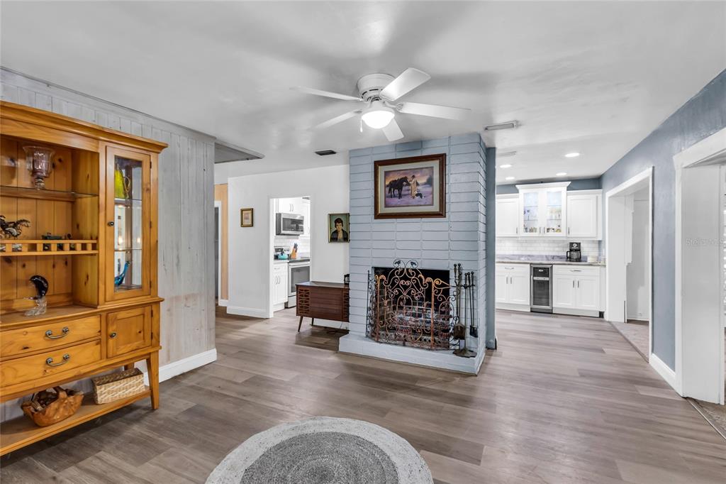 5012 West C 476 Bushnell, FL 33513 - Photo 17 of 42 a living room with furniture and a fireplace