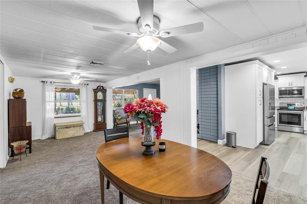 5012 West C 476 Bushnell, FL 33513 - Photo 21 of 42 a view of a dining room with furniture