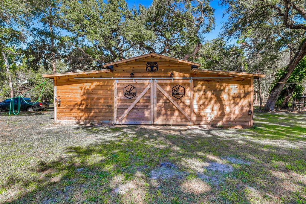 5012 West C 476 Bushnell, FL 33513 - Photo 5 of 42 a view of outdoor space with garden and trees