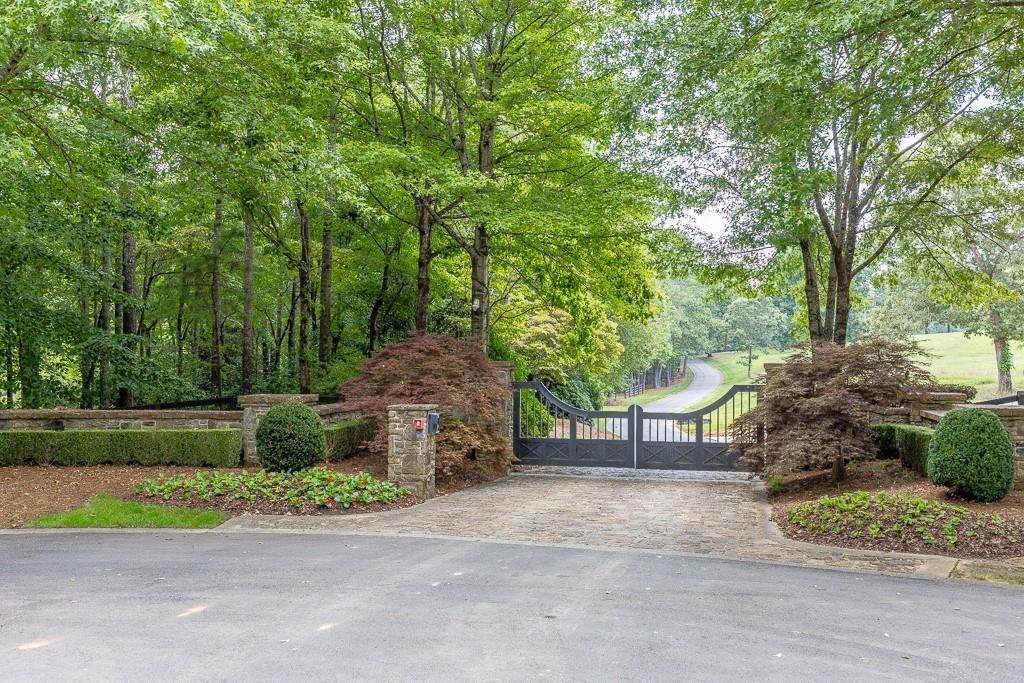 5775 Kennedy Road Suwanee, GA 30024 - Photo 3 of 23 a view of garden with trees