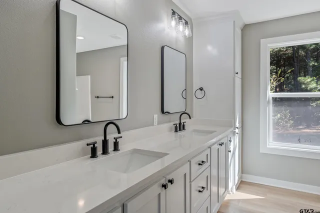 a bathroom with a tub and shower