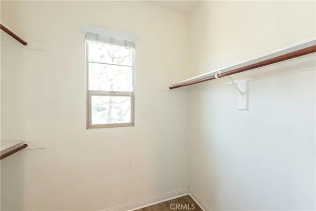 a view of a room with racks on the wall