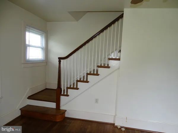 a view of entryway with wooden floor
