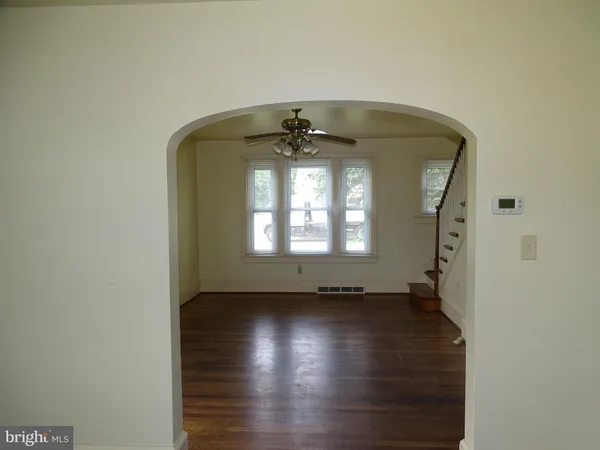 a view of entryway with wooden floor