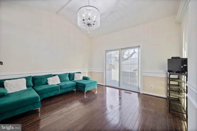 a view of a porch with wooden floor and stairs