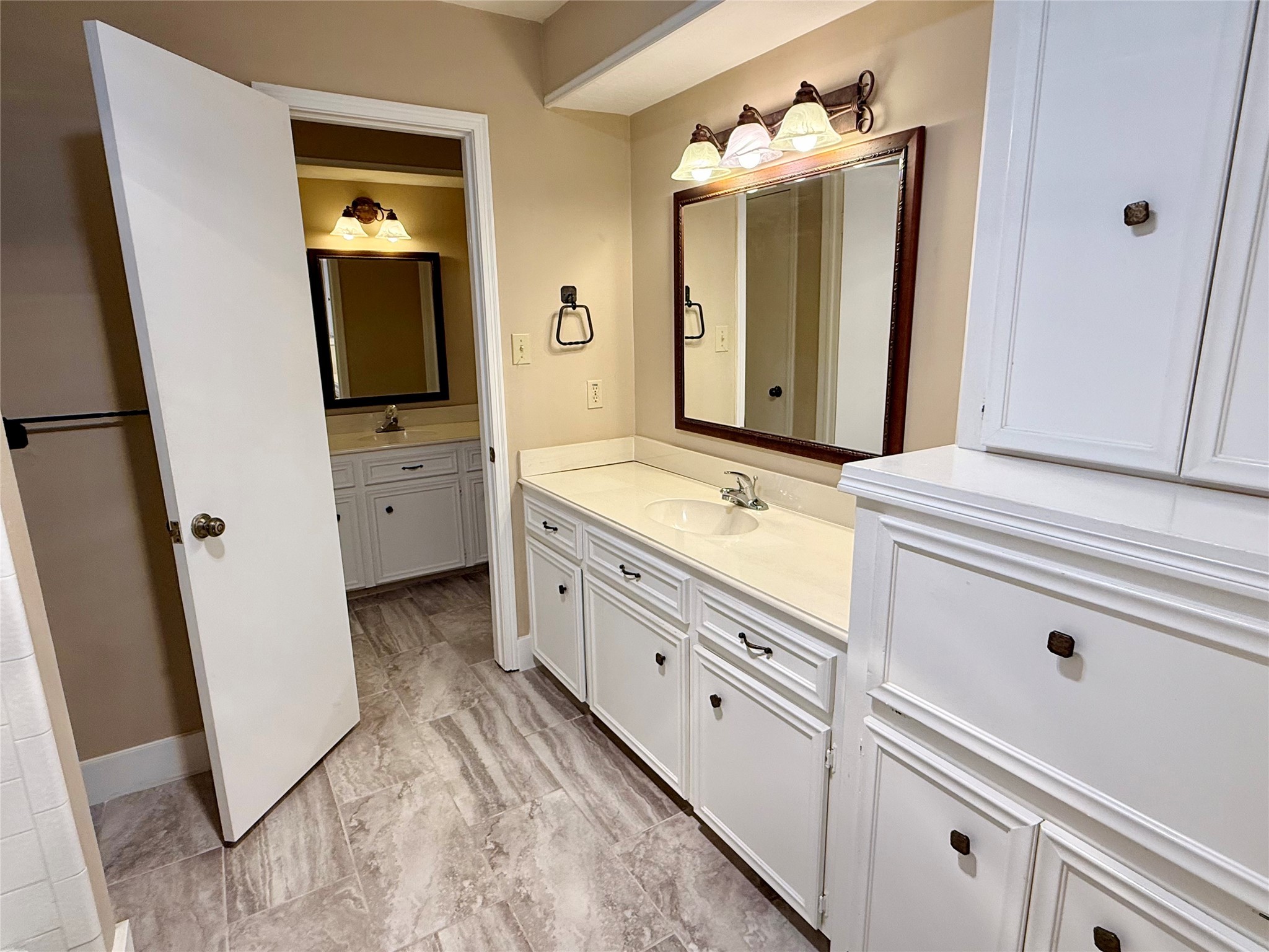 16711 Sir William Drive Spring, TX 77379 - Photo 15 of 21 a spacious bathroom with a sink and a mirror