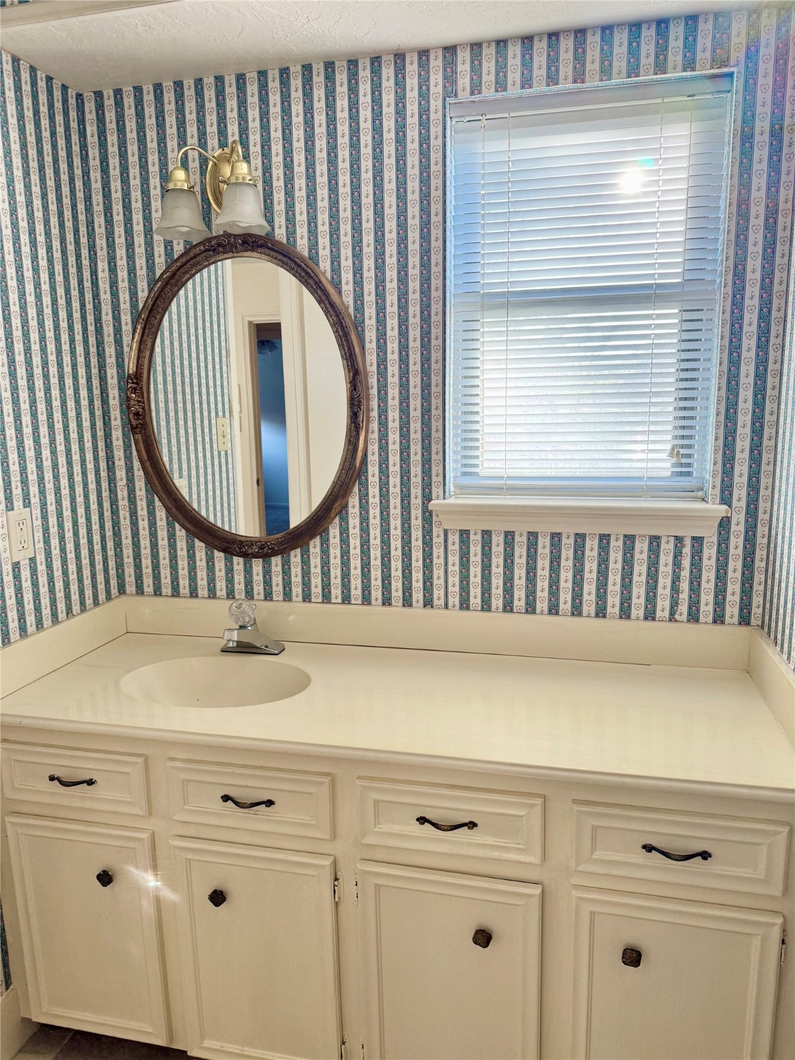 16711 Sir William Drive Spring, TX 77379 - Photo 17 of 21 a close view of a sink vanity with granite bathroom