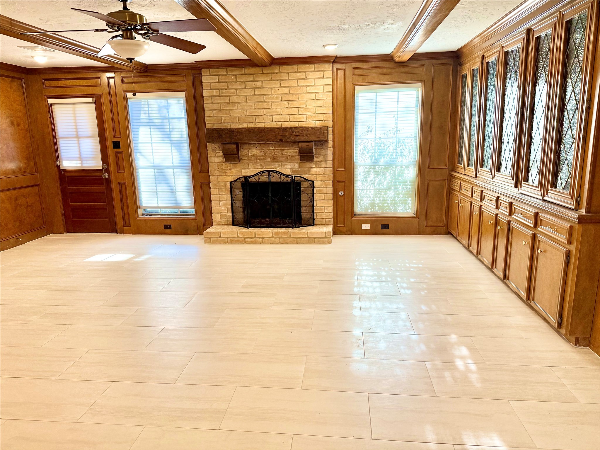 16711 Sir William Drive Spring, TX 77379 - Photo 4 of 21 a view of an empty room with a fireplace and a window
