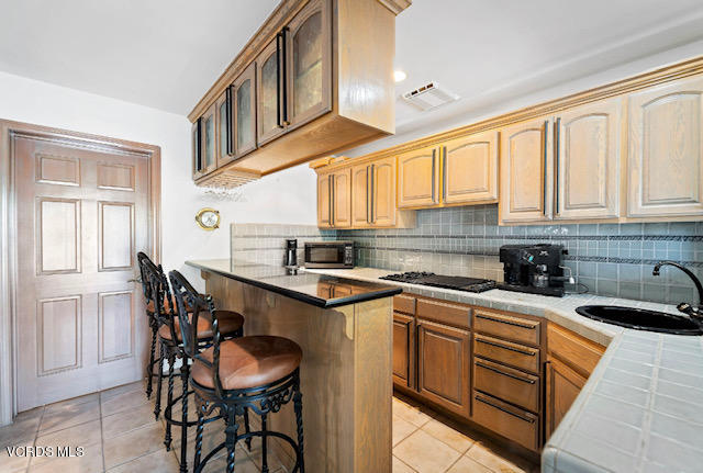 2045 Ravoli Drive Oxnard, CA 93035 - Photo 7 of 36 2043 bottom kitchen side angle