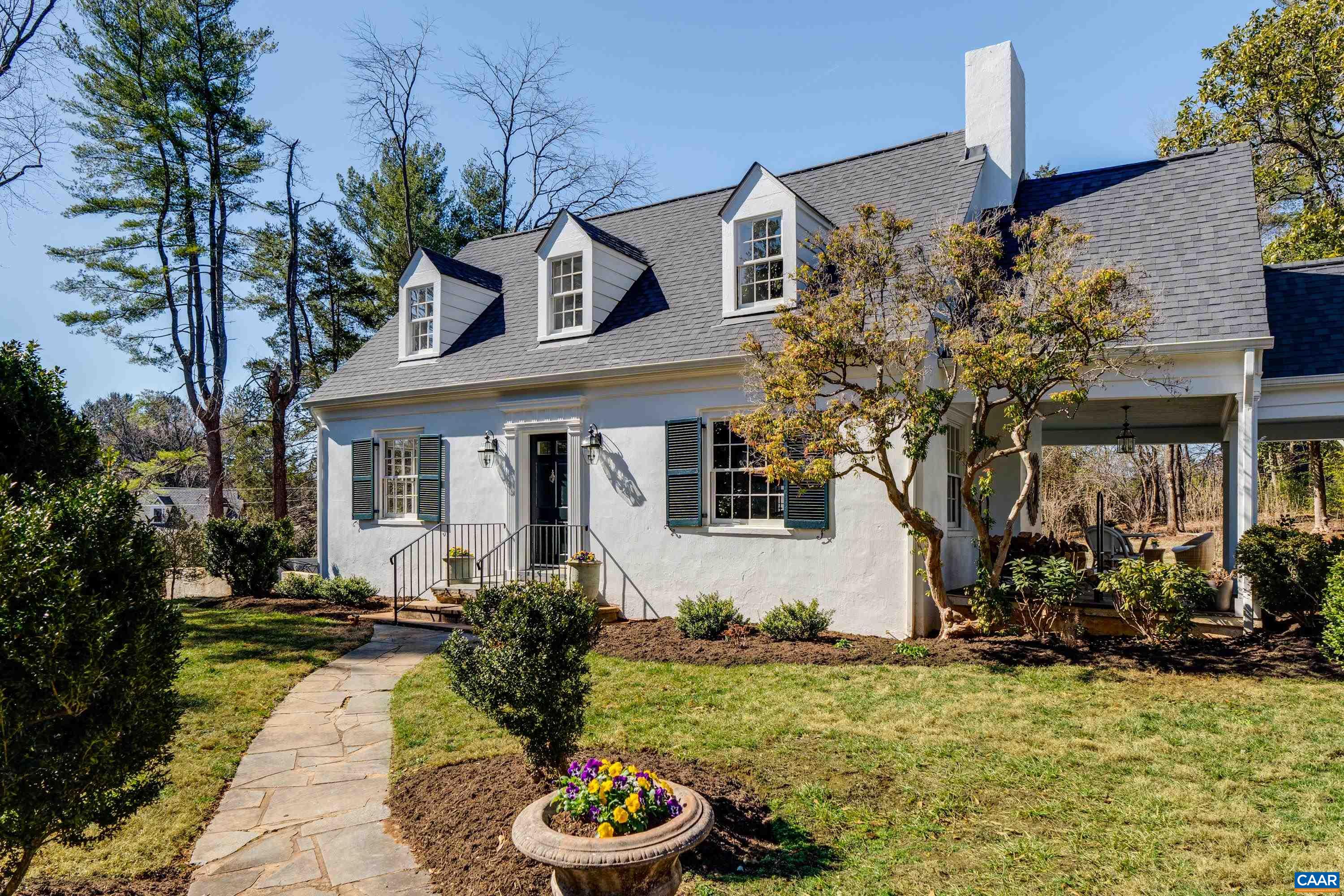 12 Old Farm Road Charlottesville, VA 22903 - Photo 2 of 39 a front view of a house with a garden