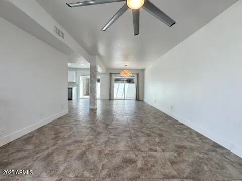 a view of a hallway with a room