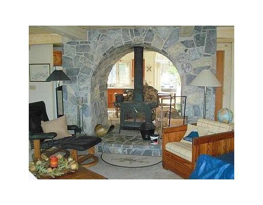 56 Riverlocks Road Kennebunk, ME 04043 - Photo 7 of 20 Living Room. Woodstove