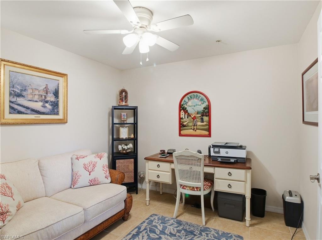 20161 Bravada Street, Unit 2 Estero, FL 33928 - Photo 13 of 34 Office area with ceiling fan and light tile patterned floors