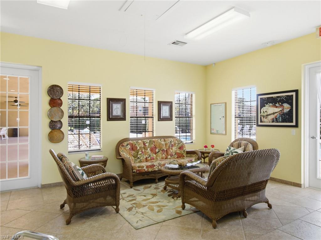 20161 Bravada Street, Unit 2 Estero, FL 33928 - Photo 32 of 34 Living area with baseboards and attic access