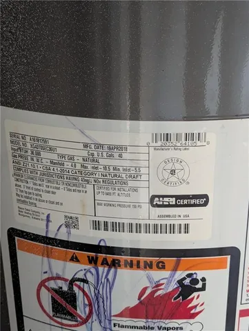 a bathroom with a bathtub and toilet