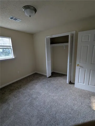 an empty room with a workbench