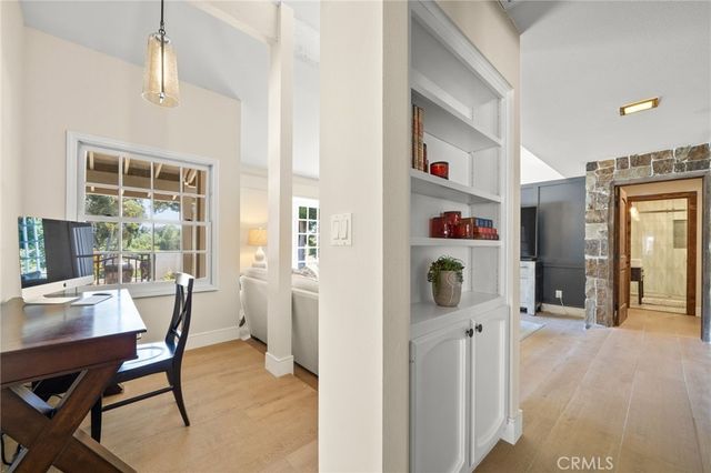 a view of a livingroom with furniture and window
