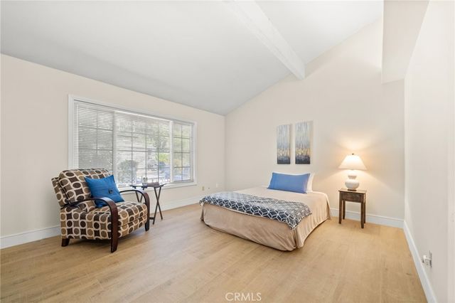 a bedroom with furniture and a couch