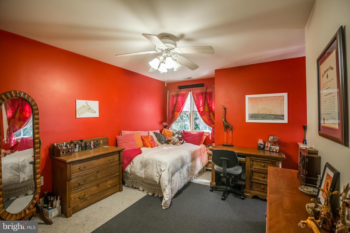 3900 Chaneyville Road Owings, MD 20736 - Photo 19 of 30 a bedroom with furniture and a bed