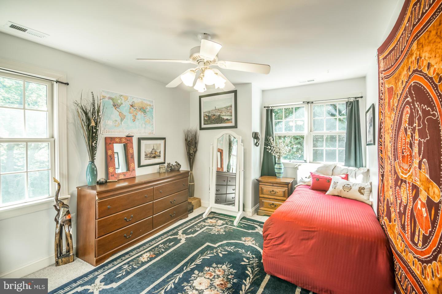 3900 Chaneyville Road Owings, MD 20736 - Photo 21 of 30 a bedroom with furniture and wooden floor