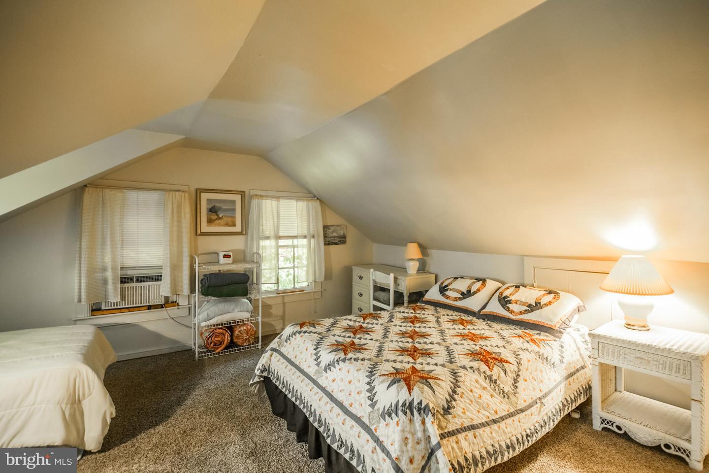 3900 Chaneyville Road Owings, MD 20736 - Photo 29 of 30 a spacious bedroom with a bed and wooden floor