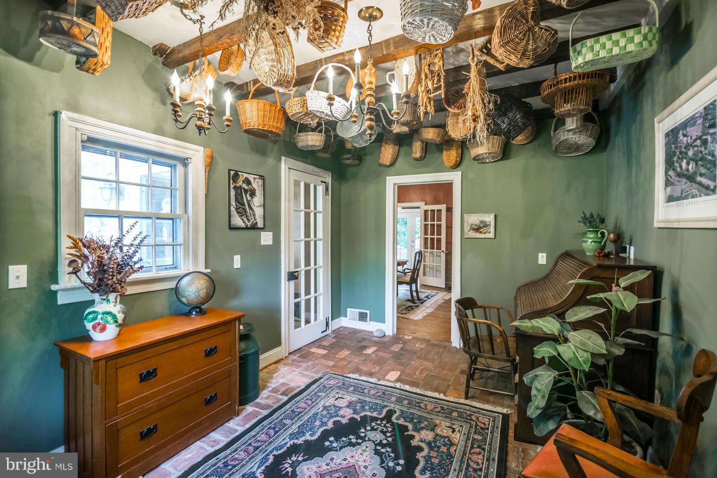 3900 Chaneyville Road Owings, MD 20736 - Photo 7 of 30 a dining room filled with furniture and a chandelier