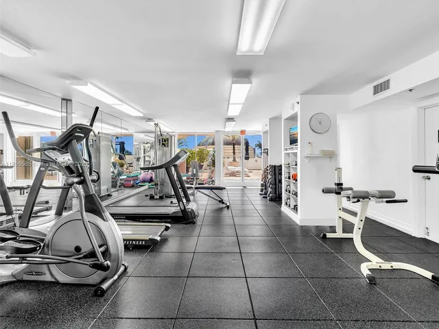 a view of a swimming pool with an outdoor seating