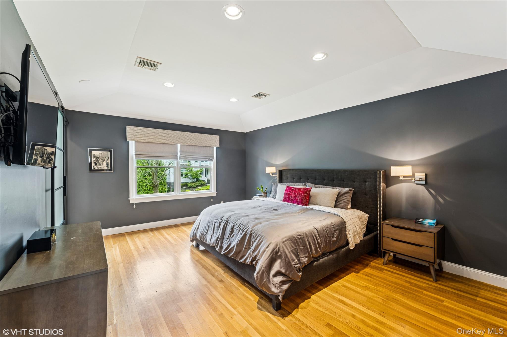 15 Flamingo Road East Hills, NY 11576 - Photo 20 of 41 Primary Bedroom featuring wood floors, recessed lighting, and lofted ceiling