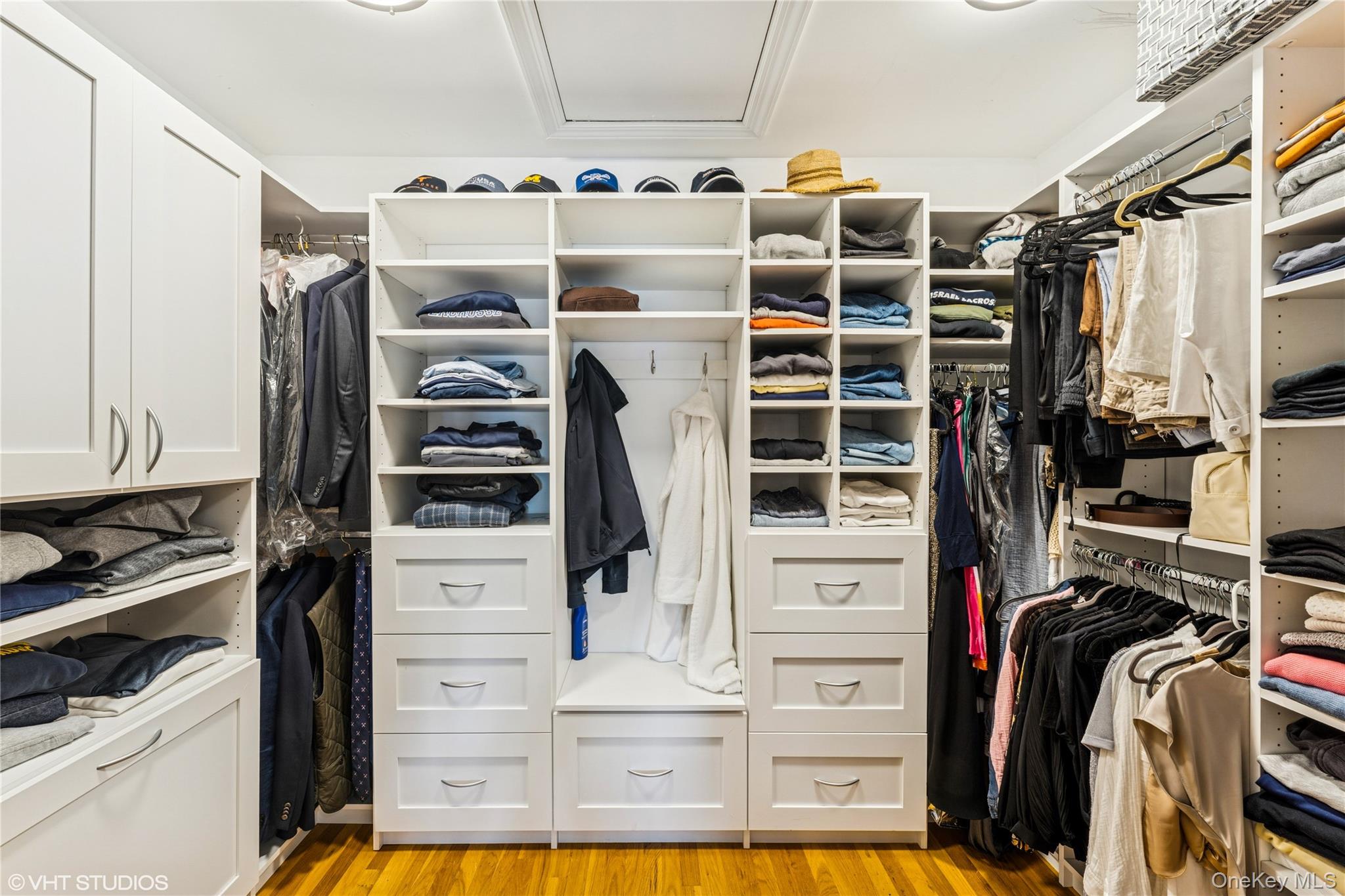 15 Flamingo Road East Hills, NY 11576 - Photo 22 of 41 Walk in closet featuring wood floors