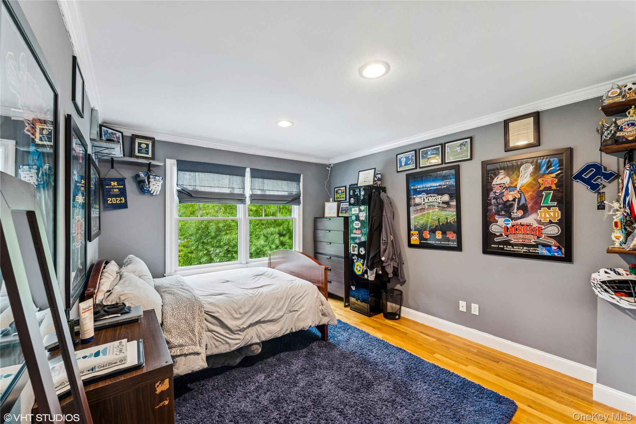 15 Flamingo Road East Hills, NY 11576 - Photo 26 of 41 Bedroom with wood floors, molding, and recessed lighting