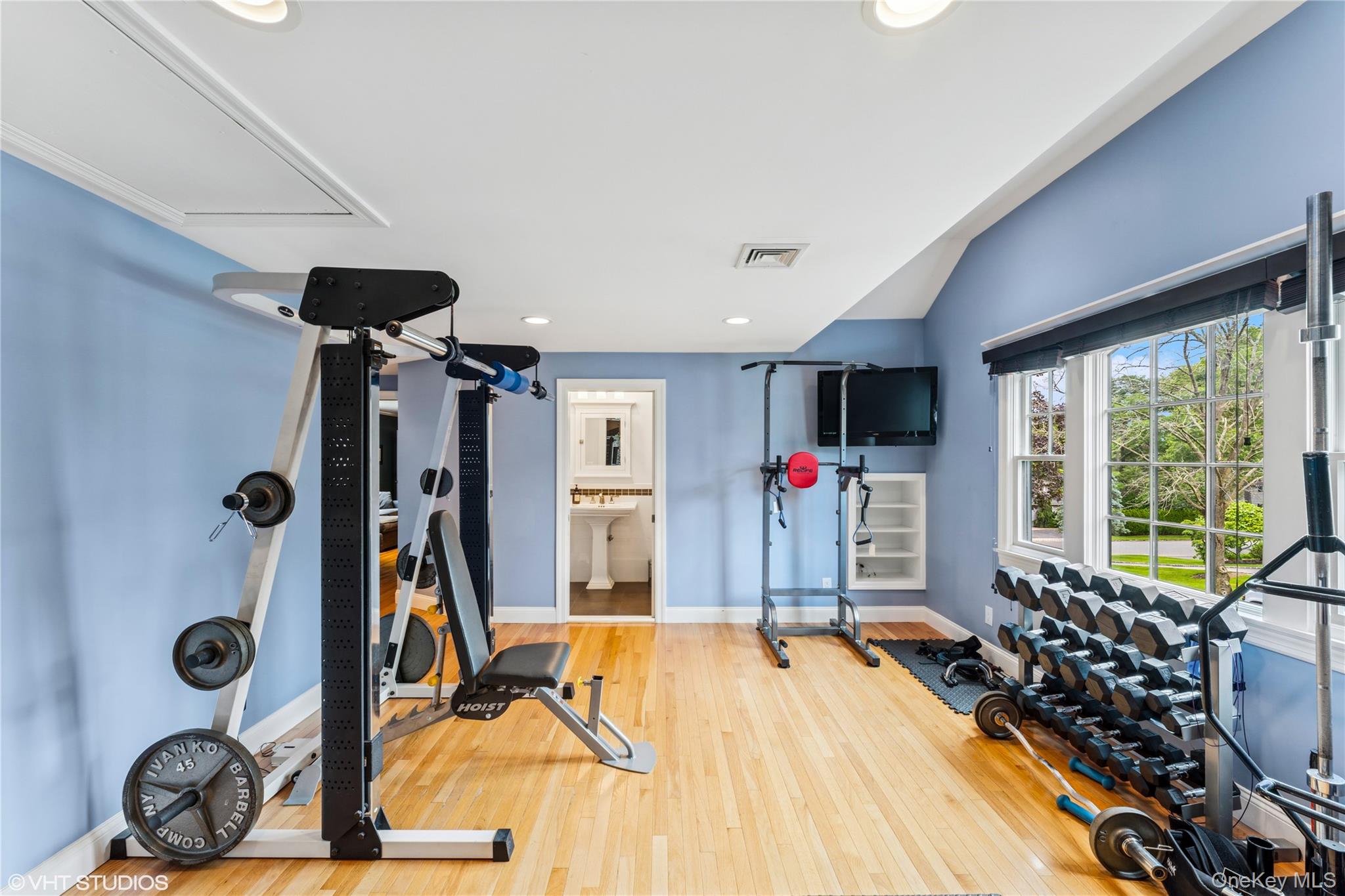 15 Flamingo Road East Hills, NY 11576 - Photo 33 of 41 Workout area with wood finished floors and recessed lighting