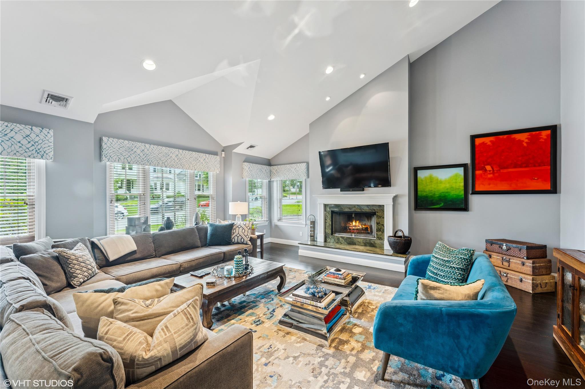 15 Flamingo Road East Hills, NY 11576 - Photo 10 of 41 Living room featuring high vaulted ceiling, wood finished floors, a fireplace, and recessed lighting
