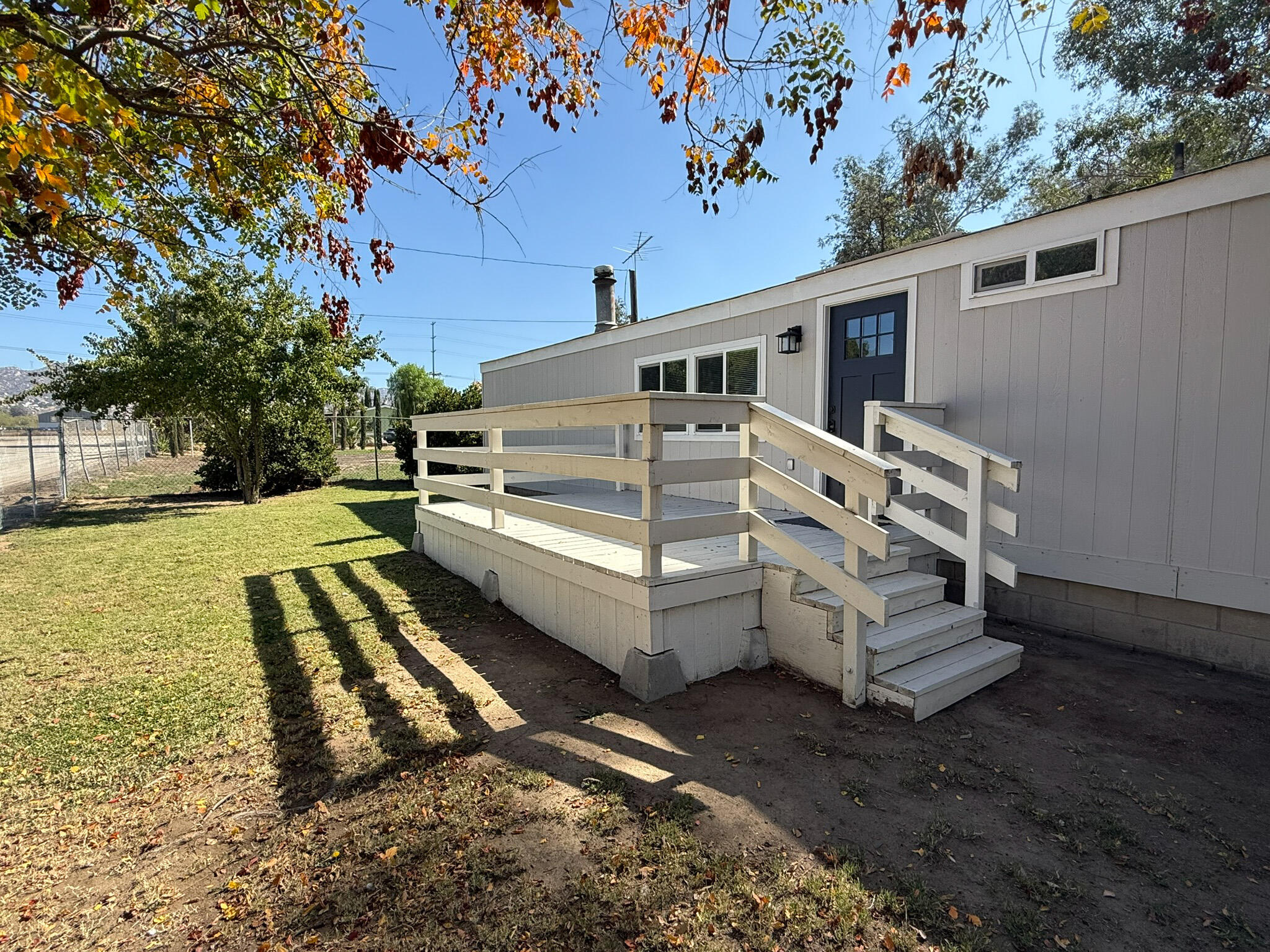 28495 Roan Ranch Road Menifee, CA 92585 - Photo 3 of 40 a view of a house with a yard