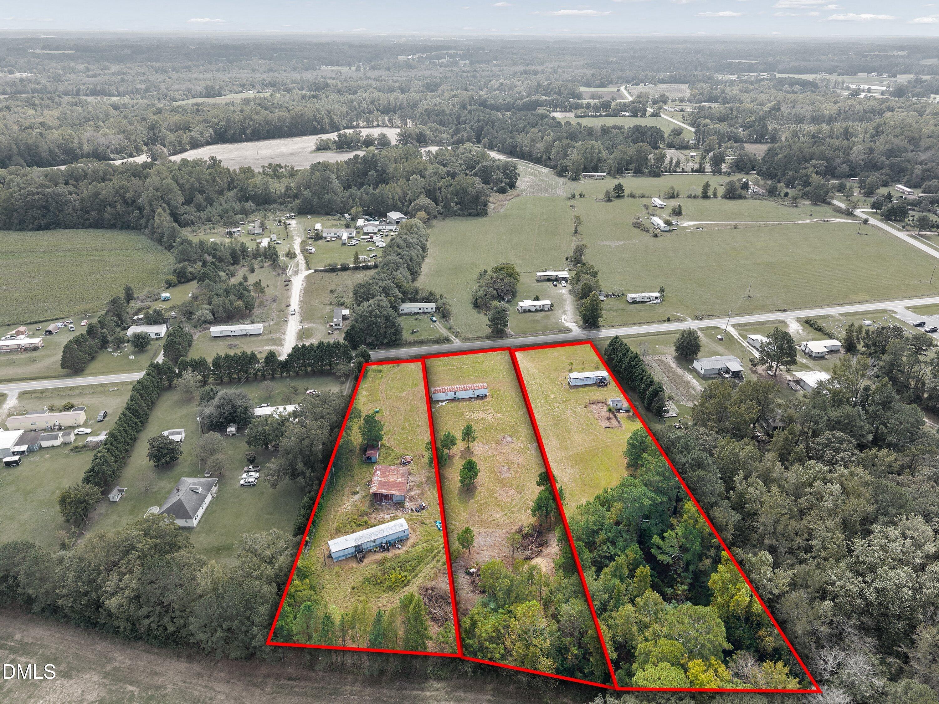460 Webb Mill Road Four Oaks, NC 27524 - Photo 5 of 6 an aerial view of residential houses with outdoor space