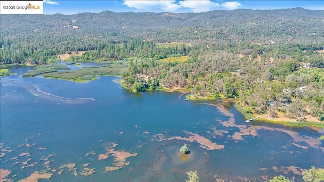 a view of a lake with mountain