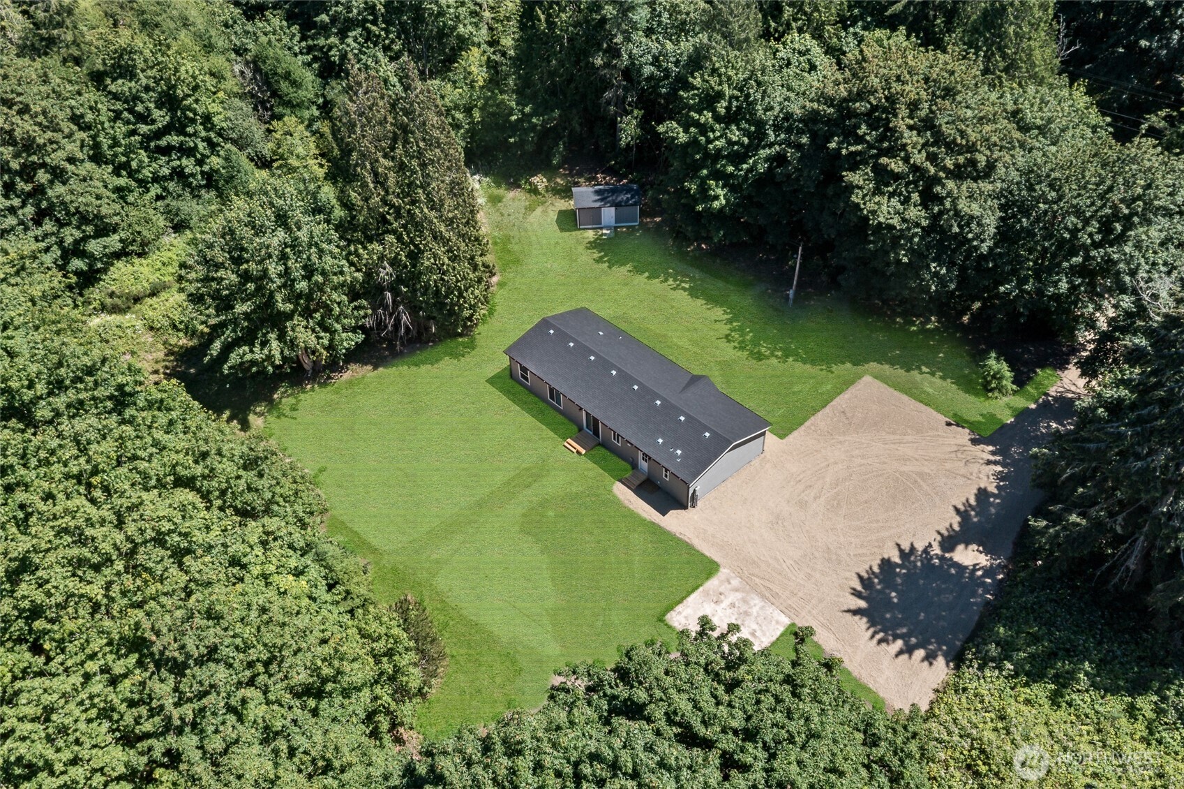 17217 80th Street Southwest Longbranch, WA 98351 - Photo 38 of 39 an aerial view of a house with a yard and lake view