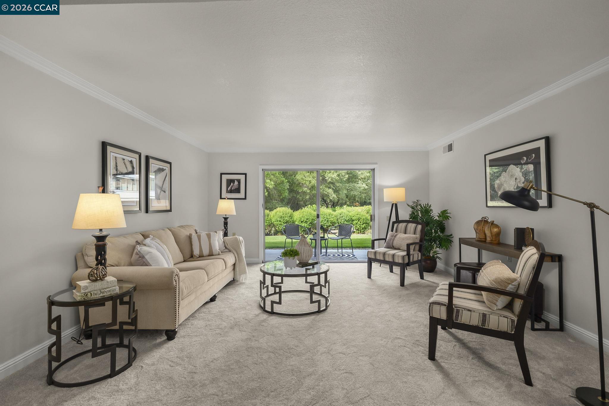 2057 Golden Rain Road, Unit 4 Walnut Creek, CA 94595 - Photo 13 of 20 a living room with furniture and a large window